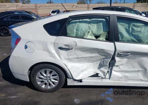 2014 Toyota Prius Plug-In z USA, uszkodzony, nr VIN JTDKN3DP2E3052772